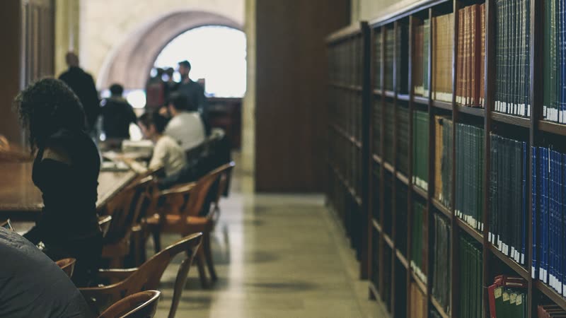 Readers in a library